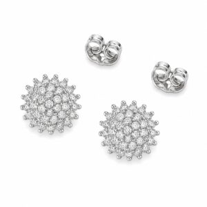 A pair of round silver stud earrings featuring a cluster or sunburst design heavily paved with clear stones.