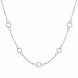 silver chain necklace featuring evenly spaced small open circular stations.