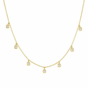 Gold chain necklace featuring evenly spaced dangling clear stones.