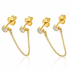 A pair of gold stud earrings featuring a single clear stone and a dangling chain