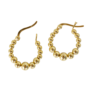 A pair of gold hoop earrings featuring a beaded design with spheres