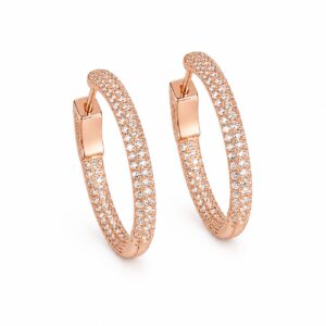 A pair of thick rose gold hoop earrings set with clear stones.