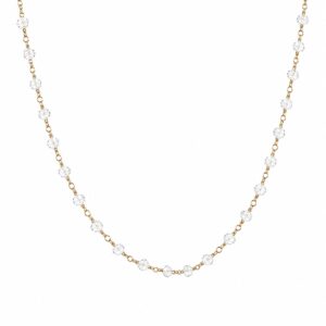 gold chain necklace featuring evenly spaced small clear crystal gemstones