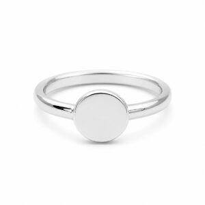 A silver ring featuring a flat, circular top.