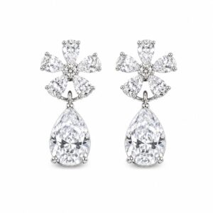 silver dangle earrings featuring a floral cluster of clear stones with a large pear-shaped stone drop.