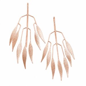 A pair of large rose gold dangling statement earrings featuring a spiky leaf design