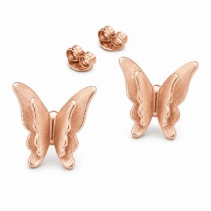 A pair of rose gold stud earrings shaped like delicate butterflies.