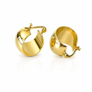 A pair of wide, smooth gold hoop earrings.