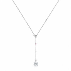 Silver necklace featuring a tiny clear stone at the junction and a simple vertical drop chain with a stone at the bottom