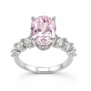 Silver ring with a large oval pink CZ centre stone and clear CZ side stones