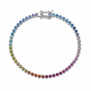 Silver tennis bracelet featuring a continuous row of multi-colored round stones in a rainbow gradient and a box clasp.