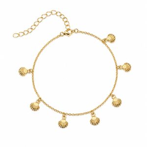 gold chain bracelet featuring evenly spaced small shells dangling and an adjustable clasp.