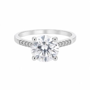 A silver ring featuring a large round clear stone and smaller clear stones.