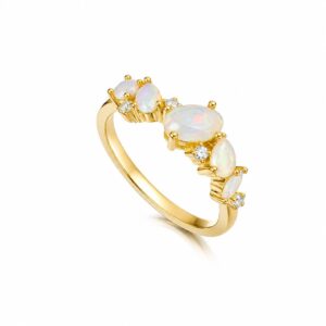 Gold-plated ring with oval, pear and round white opals and clear CZ accents
