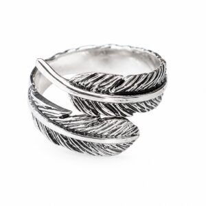 Oxidised silver wrap ring shaped like overlapping detailed feathers