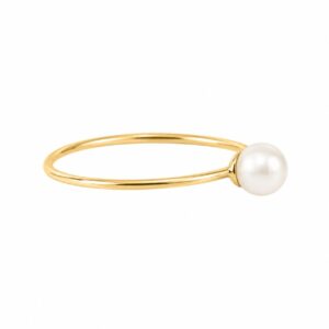 A thin gold ring featuring a white pearl.