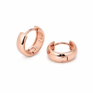 A pair of rose gold hoop earrings showing a hinge closure.