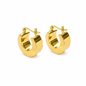A pair of small, thick, smooth gold hoop earrings.