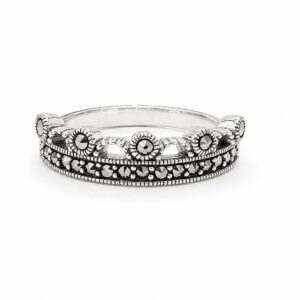 Silver crown-style ring with raised sunburst motifs, dark marcasite stones and beaded borders