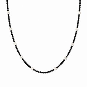 A necklace made of a continuous strand of small black beads interspersed with occasional small white accent beads.