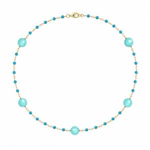 gold chain necklace featuring evenly spaced small turquoise beads and larger round turquoise accent beads.