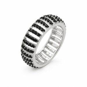 A silver ring featuring rows of black stones.