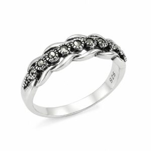 Silver ring with overlapping wavy bands and a row of dark marcasite stones