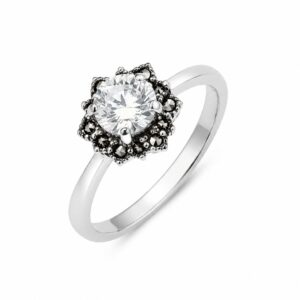 Angled view of a silver CZ and marcasite flower ring with a round clear centre stone