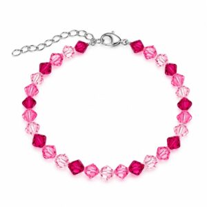 A bracelet featuring pink beads, with a clasp and an adjustable extender chain.