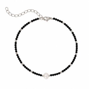 bracelet made of small black beads with a pearl in the centre, featuring a silver adjustable clasp.