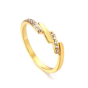 A delicate gold ring featuring a small, angular detail set with stones.