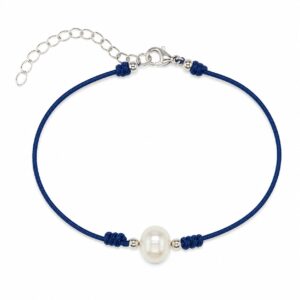 Navy blue silk bracelet featuring a central freshwater pearl with small two silver beads and decorative knots, with a silver clasp and adjustable extender chain.